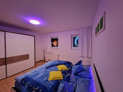 Ein Bett oder Betten in einem Zimmer der Unterkunft Ferienwohnung Esther