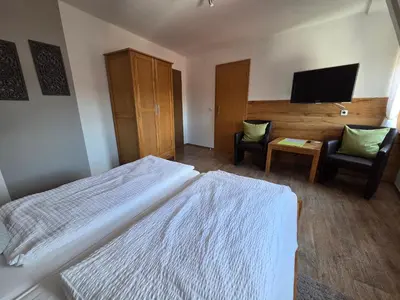 Ein Bett oder Betten in einem Zimmer der Unterkunft Pension ohne Frühstück