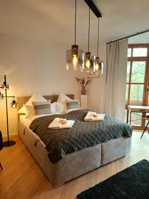 Ein Bett oder Betten in einem Zimmer der Unterkunft Select-Home 5 - Entspannen & Wohlfühlen am Stausee