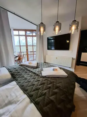 Ein Bett oder Betten in einem Zimmer der Unterkunft Select-Home 5 - Entspannen & Wohlfühlen am Stausee