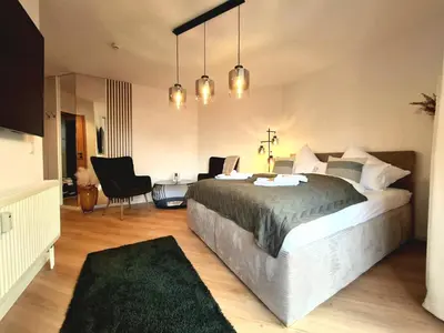 Ein Bett oder Betten in einem Zimmer der Unterkunft Select-Home 5 - Entspannen & Wohlfühlen am Stausee