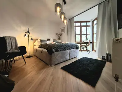 Ein Bett oder Betten in einem Zimmer der Unterkunft Select-Home 5 - Entspannen & Wohlfühlen am Stausee