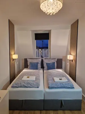 Ein Bett oder Betten in einem Zimmer der Unterkunft Suite del Pueblo