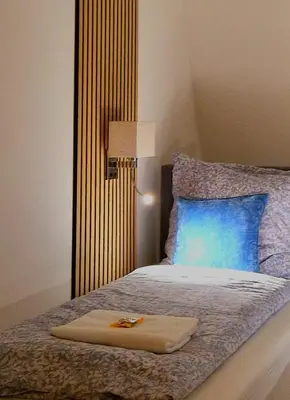 Ein Bett oder Betten in einem Zimmer der Unterkunft Suite del Pueblo