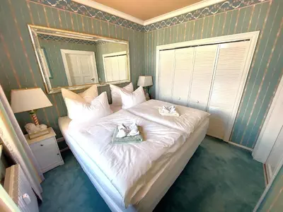 Ein Bett oder Betten in einem Zimmer der Unterkunft Villa Lindenhof