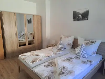 Ein Bett oder Betten in einem Zimmer der Unterkunft Ferienwohnung Carolagrün
