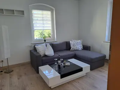 Ein Sitzbereich in der Unterkunft Ferienwohnung Carolagrün