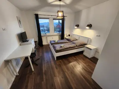 Ein Bett oder Betten in einem Zimmer der Unterkunft große moderne Unterkunft in Wunsiedel