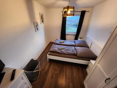 Ein Bett oder Betten in einem Zimmer der Unterkunft große moderne Unterkunft in Wunsiedel