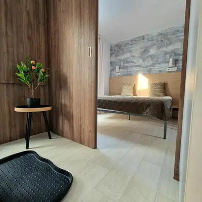 Ein Bett oder Betten in einem Zimmer der Unterkunft Mobilheim am Murner See - privater Badezuber & Grill