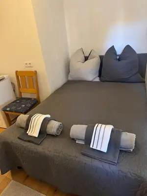 Ein Bett oder Betten in einem Zimmer der Unterkunft Haus mit Herz