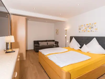 Ein Bett oder Betten in einem Zimmer der Unterkunft Ferienwohnung Speichersdorf