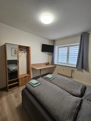 Ein Bett oder Betten in einem Zimmer der Unterkunft Centro - bis 9 Gäste