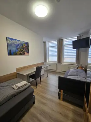 Ein Bett oder Betten in einem Zimmer der Unterkunft Centro - bis 9 Gäste