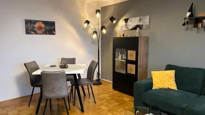 Ein Sitzbereich in der Unterkunft Gemütliches Apartment mit Balkon und Parkplatz im Zentrum