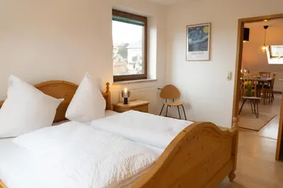Ein Bett oder Betten in einem Zimmer der Unterkunft Ferienwohnung Härtl