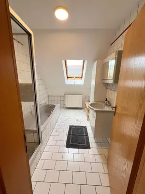 Ein Bett oder Betten in einem Zimmer der Unterkunft Ferienwohnung Härtl