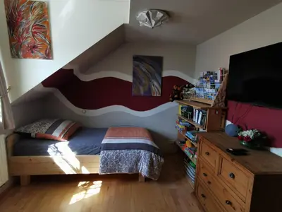 Ein Bett oder Betten in einem Zimmer der Unterkunft FeWo-AdOlTi