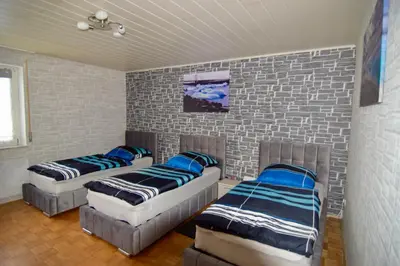 Ein Bett oder Betten in einem Zimmer der Unterkunft Ferienwohnung Kulmbach
