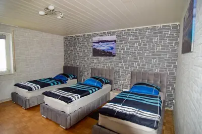 Ein Bett oder Betten in einem Zimmer der Unterkunft Ferienwohnung Kulmbach