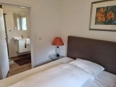 Ein Bett oder Betten in einem Zimmer der Unterkunft Ferienhaus Sanddornweg an der Therme Obernsees