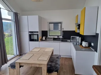 Küche/Küchenzeile in der Unterkunft Ferienhaus Sanddornweg an der Therme Obernsees
