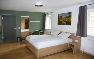 Ein Bett oder Betten in einem Zimmer der Unterkunft Schloss Thurnau