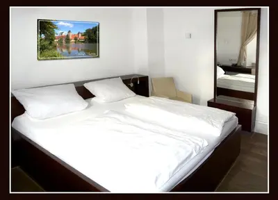 Ein Bett oder Betten in einem Zimmer der Unterkunft Schloss Thurnau
