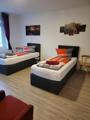 Ein Bett oder Betten in einem Zimmer der Unterkunft Ferienwohnung kopp in Plauen