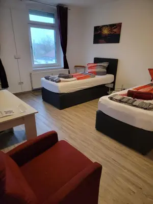 Ein Bett oder Betten in einem Zimmer der Unterkunft Ferienwohnung kopp in Plauen