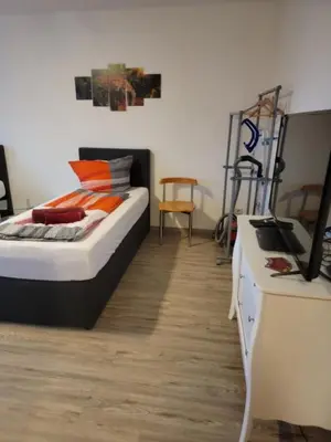 Ein Bett oder Betten in einem Zimmer der Unterkunft Ferienwohnung kopp in Plauen
