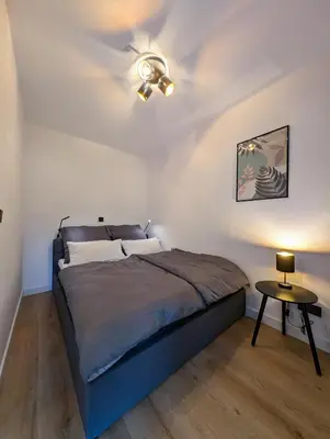 Ein Bett oder Betten in einem Zimmer der Unterkunft Moderne Ferienwohnung in ruhiger idyllischer Lage 2 plus 2 Personen möglich