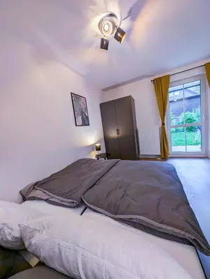 Ein Bett oder Betten in einem Zimmer der Unterkunft Moderne Ferienwohnung in ruhiger idyllischer Lage 2 plus 2 Personen möglich