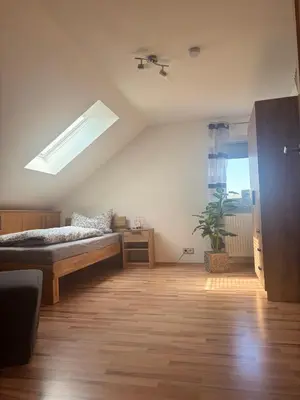 Ein Bett oder Betten in einem Zimmer der Unterkunft Ferienwohnung Schaller