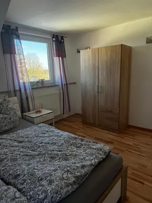 Ein Bett oder Betten in einem Zimmer der Unterkunft Ferienwohnung Schaller