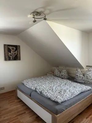 Ein Bett oder Betten in einem Zimmer der Unterkunft Ferienwohnung Schaller