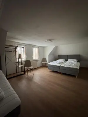 Ein Bett oder Betten in einem Zimmer der Unterkunft 4 Perfekt für jeden Zweck