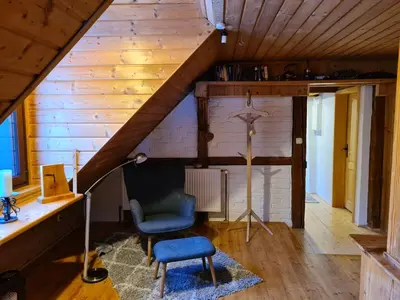 Ein Sitzbereich in der Unterkunft Ferienhaus Waldglück