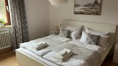 Ein Bett oder Betten in einem Zimmer der Unterkunft Green Retreat Bayreuth