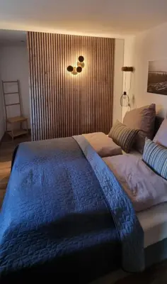 Ein Bett oder Betten in einem Zimmer der Unterkunft NEU! Gemütliche Ferienwohnung 