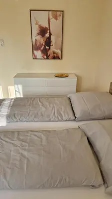 Ein Bett oder Betten in einem Zimmer der Unterkunft Ferienwohnung Küffner
