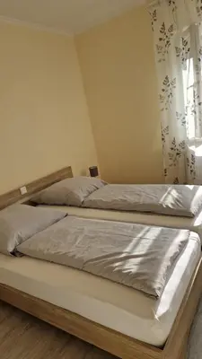 Ein Bett oder Betten in einem Zimmer der Unterkunft Ferienwohnung Küffner