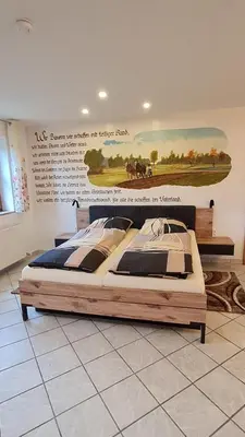 Ein Bett oder Betten in einem Zimmer der Unterkunft Campingplatz Jurahöhe