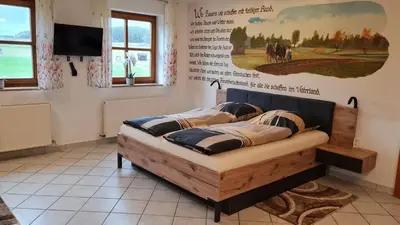 Ein Bett oder Betten in einem Zimmer der Unterkunft Campingplatz Jurahöhe