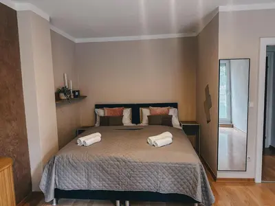 Ein Bett oder Betten in einem Zimmer der Unterkunft Sali Homes - SM0 charming Apartment short walk from city center of Bayreuth