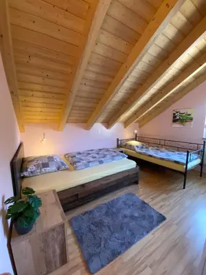 Ein Bett oder Betten in einem Zimmer der Unterkunft Haus am See Ferienhaus 4