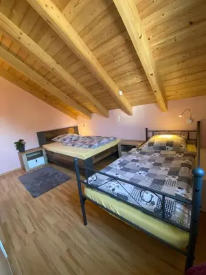 Ein Bett oder Betten in einem Zimmer der Unterkunft Haus am See Ferienhaus 4