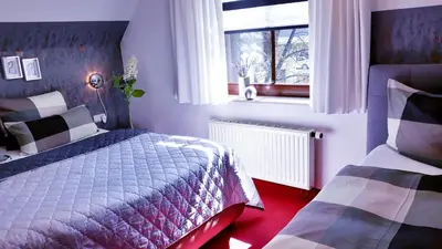 Ein Bett oder Betten in einem Zimmer der Unterkunft Apartments - Lehmanns Ferienwohnungen