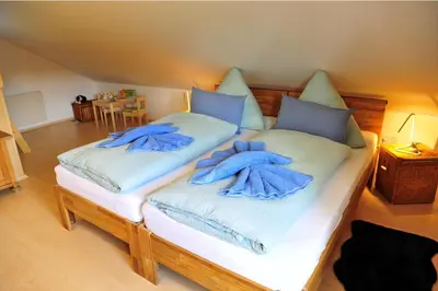 Ein Bett oder Betten in einem Zimmer der Unterkunft Exklusives Ferienhaus 