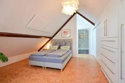 Ein Bett oder Betten in einem Zimmer der Unterkunft Ferienwohnung Scharfenberg